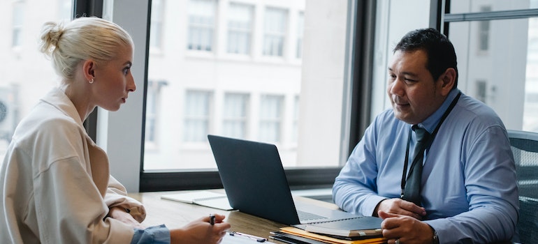 Two people at a job interview talking