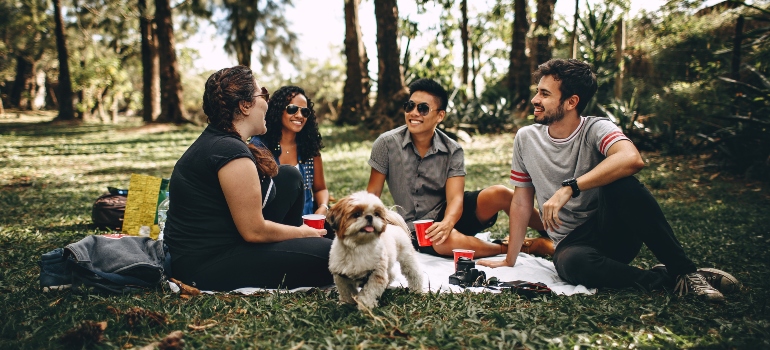 People with a dof in a park in one of the neighborhoods for families in Austin
