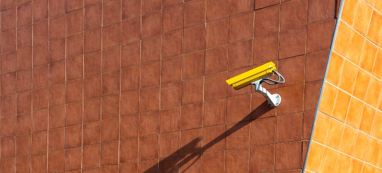 A security camera on a wall