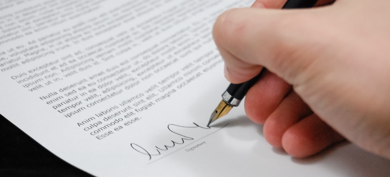 A person signing a contract