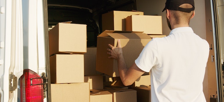 A mover carrying boxes