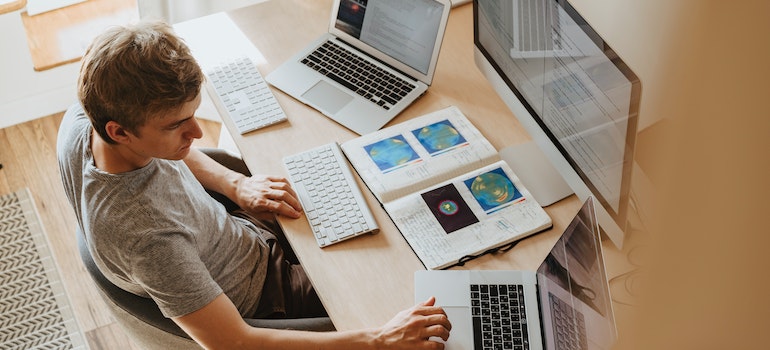 a man researching information about moving from Seattle to Vancouver