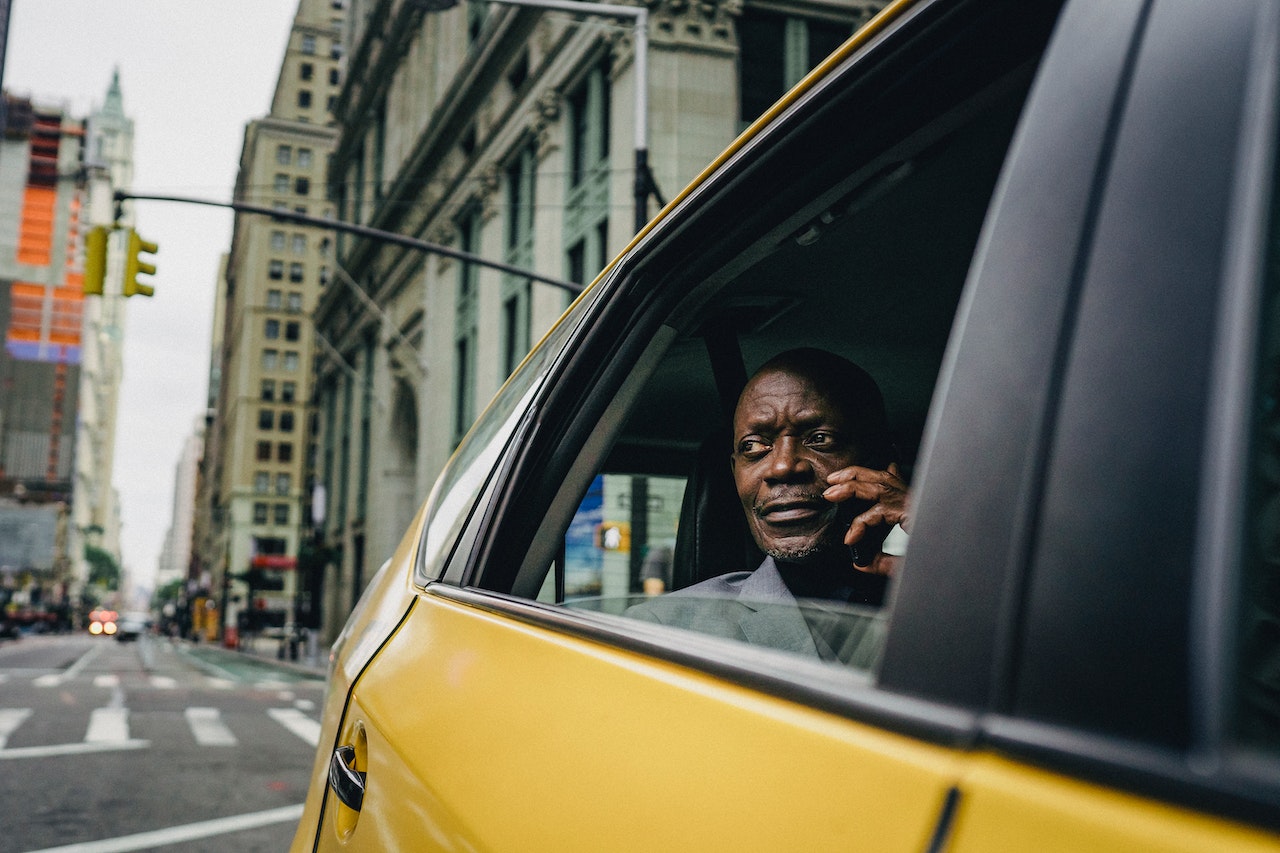 man in a taxi