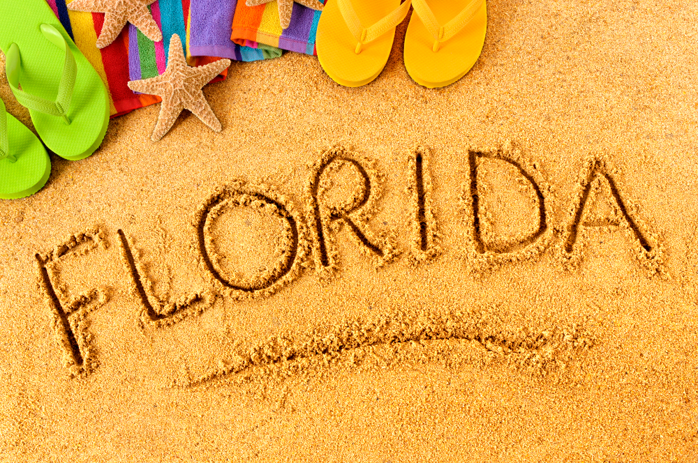 Florida written on beach sand