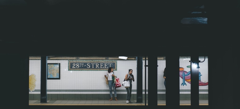 Picture of people in a subway station 