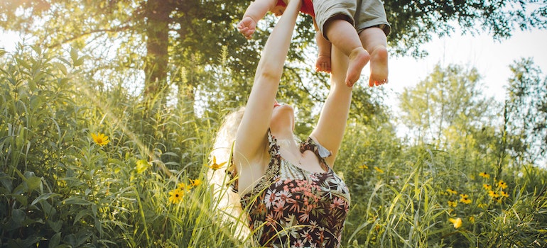 mom playing with her baby