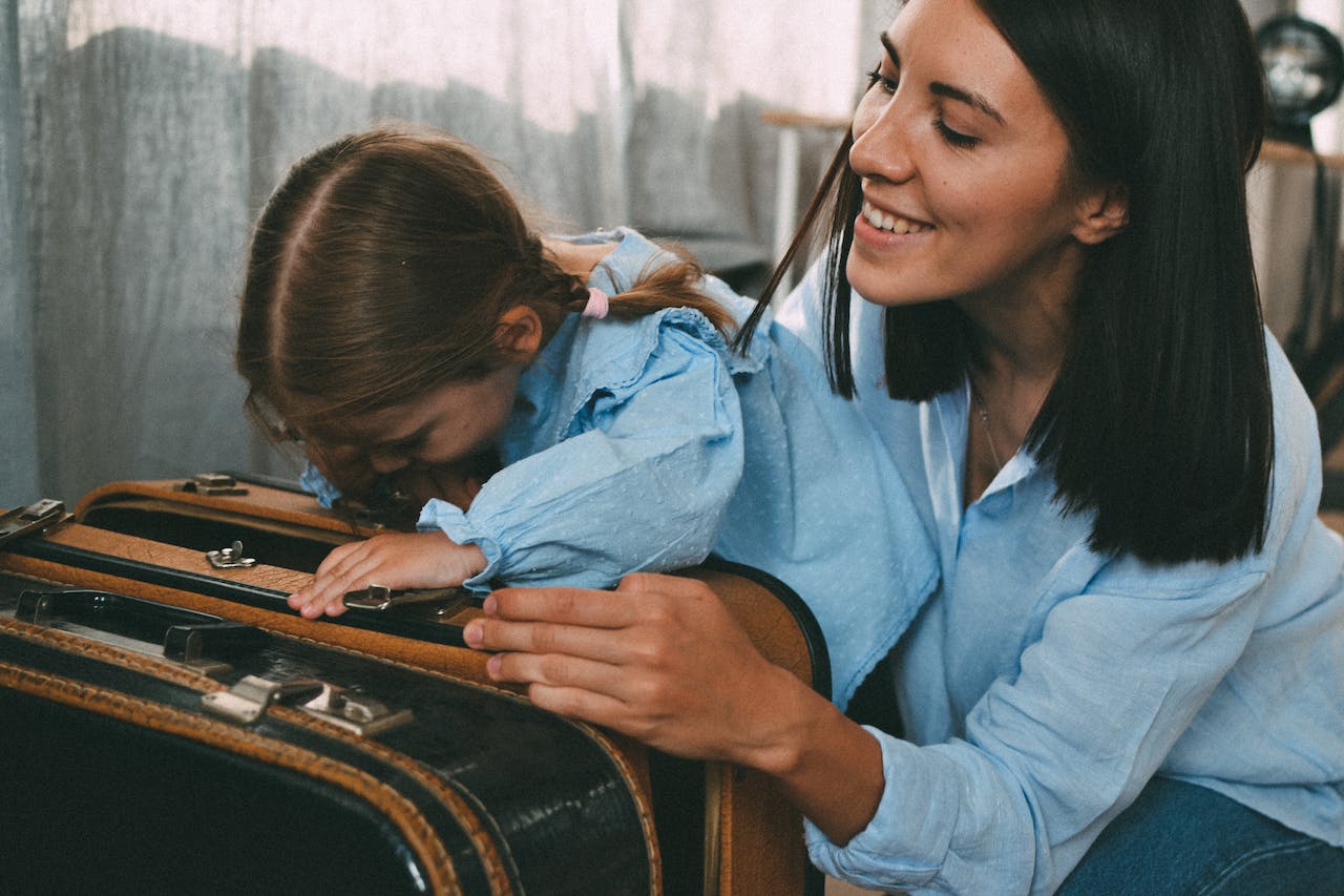mother and daughter packing