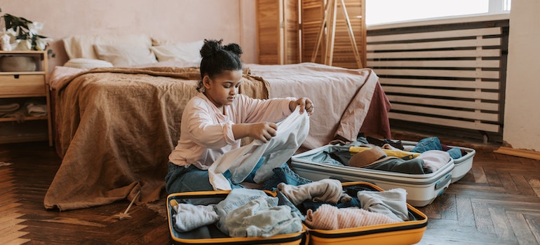 A child folding clothes
