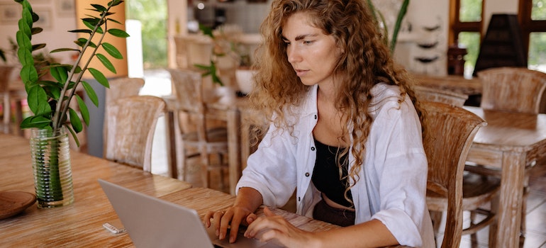 a woman working on her laptop