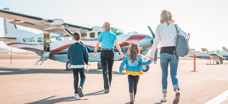 Picture of a family boarding a plane