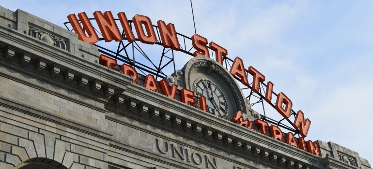 the building and logo of the Union Station in Denver