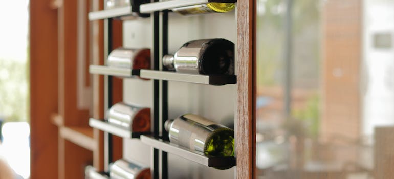 wine bottles on a shelf