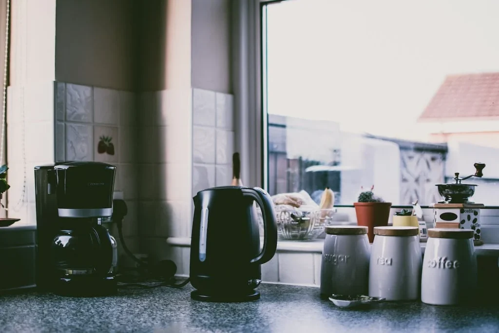 Some kitchen appliances on the counter.