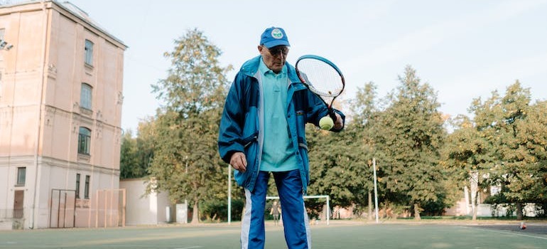 A senior playing tennis