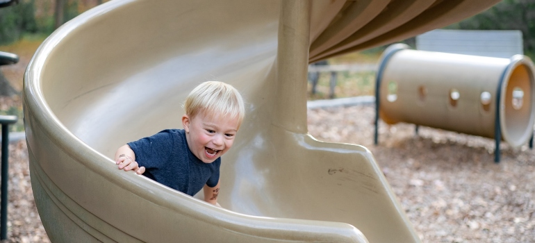 Picture of a kid on a slide