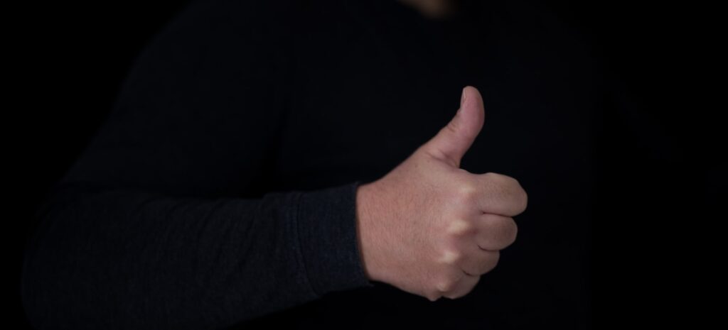 Picture of a thumbs up gesture 