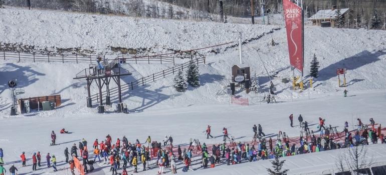 crowded ski slope in Park City attracts families to move to this top place for families in Utah