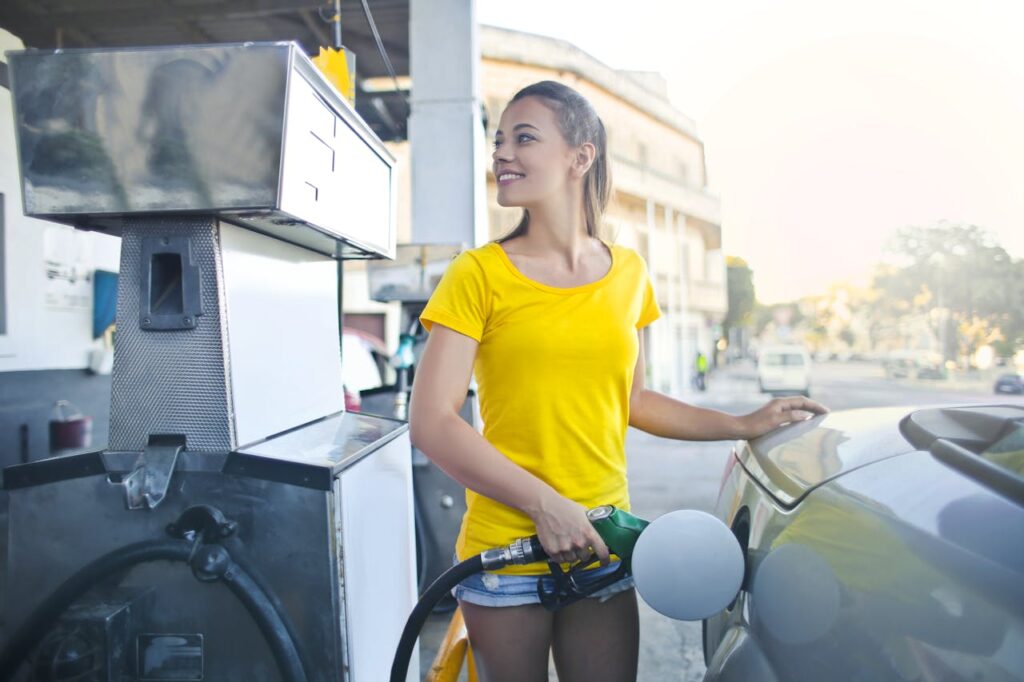 woman at a gas station 