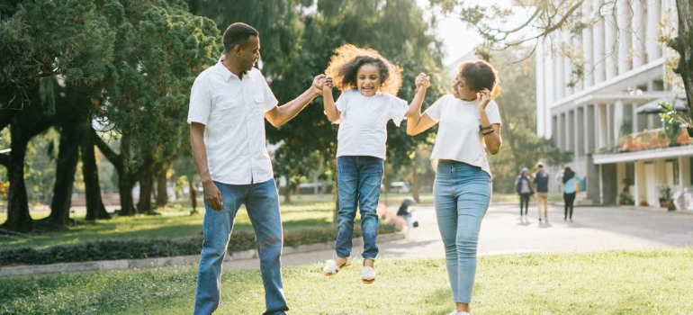 Picture of a family that is happy after moving to one of the neighborhoods for families in Baltimore