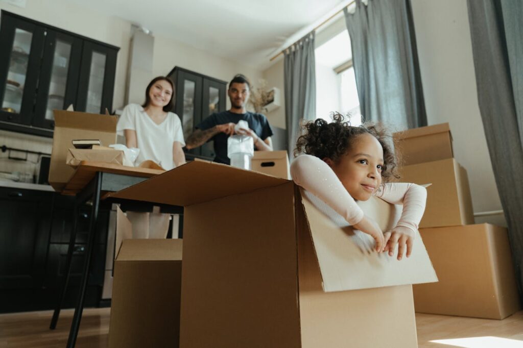 family having fun while unpacking