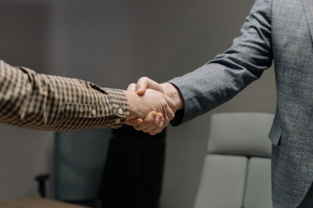 two men shaking hands