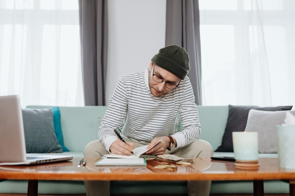 a man writing notes