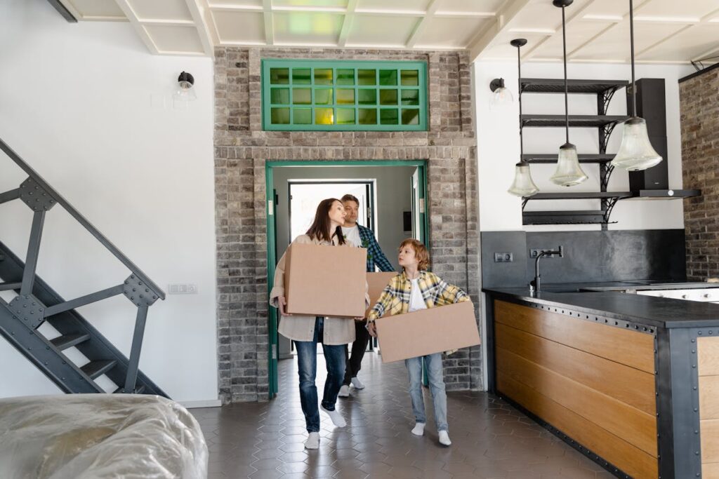 family moving into their new home after moving from Utah to Idaho