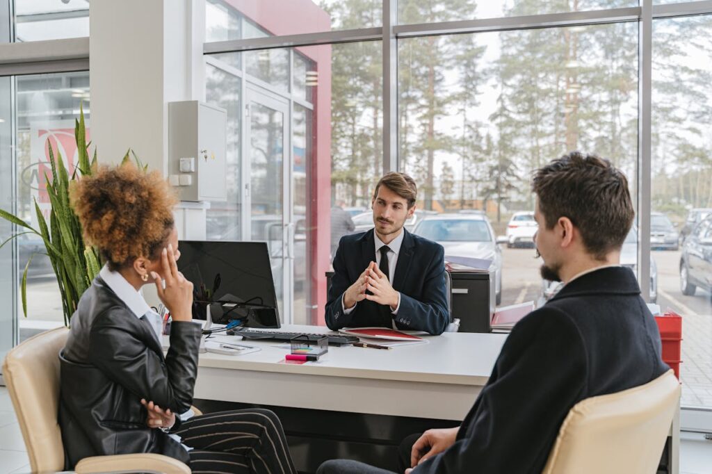 three people talking about planning a long distance business move to Orlando