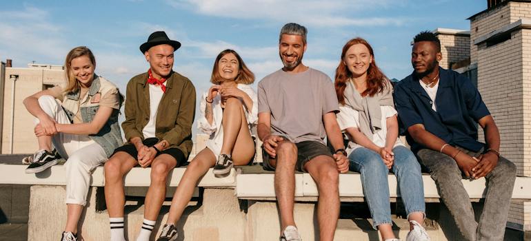 people sitting on a roof
