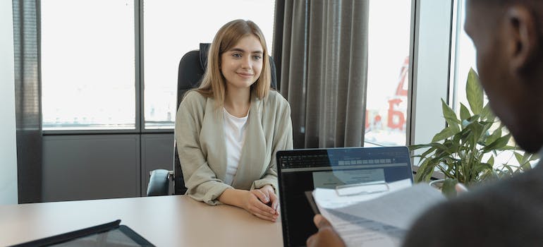 woman in a blazer having a job interview