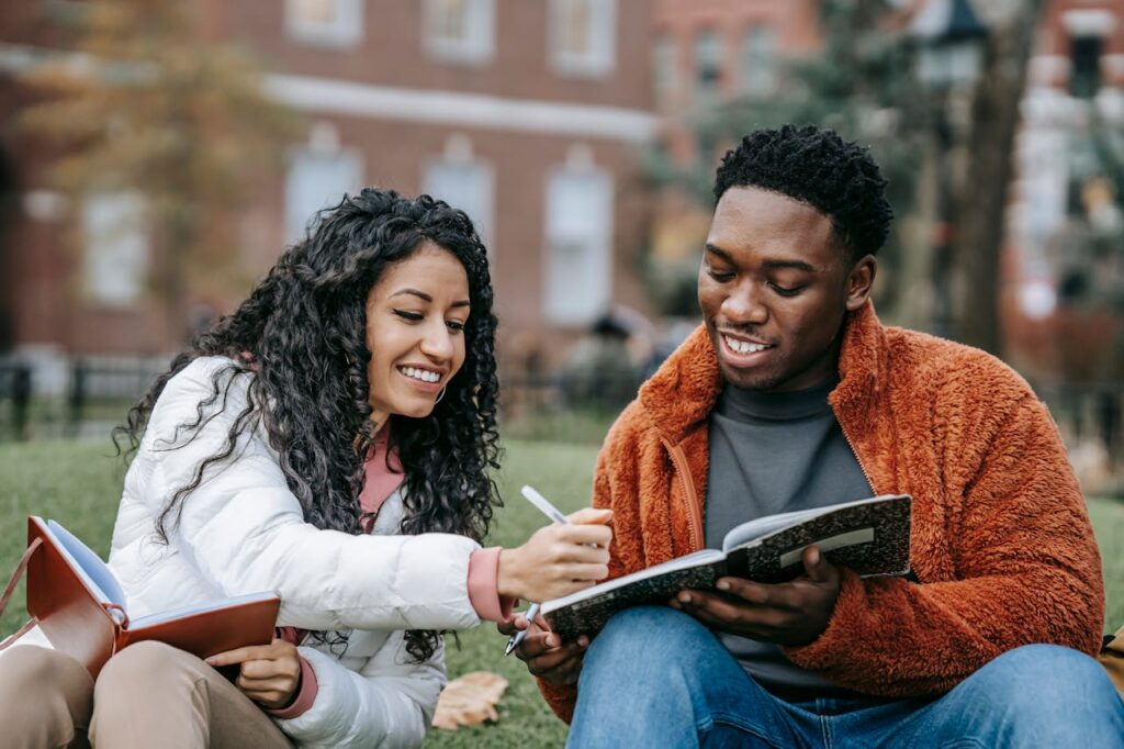man and woman reading helpful college moving tips