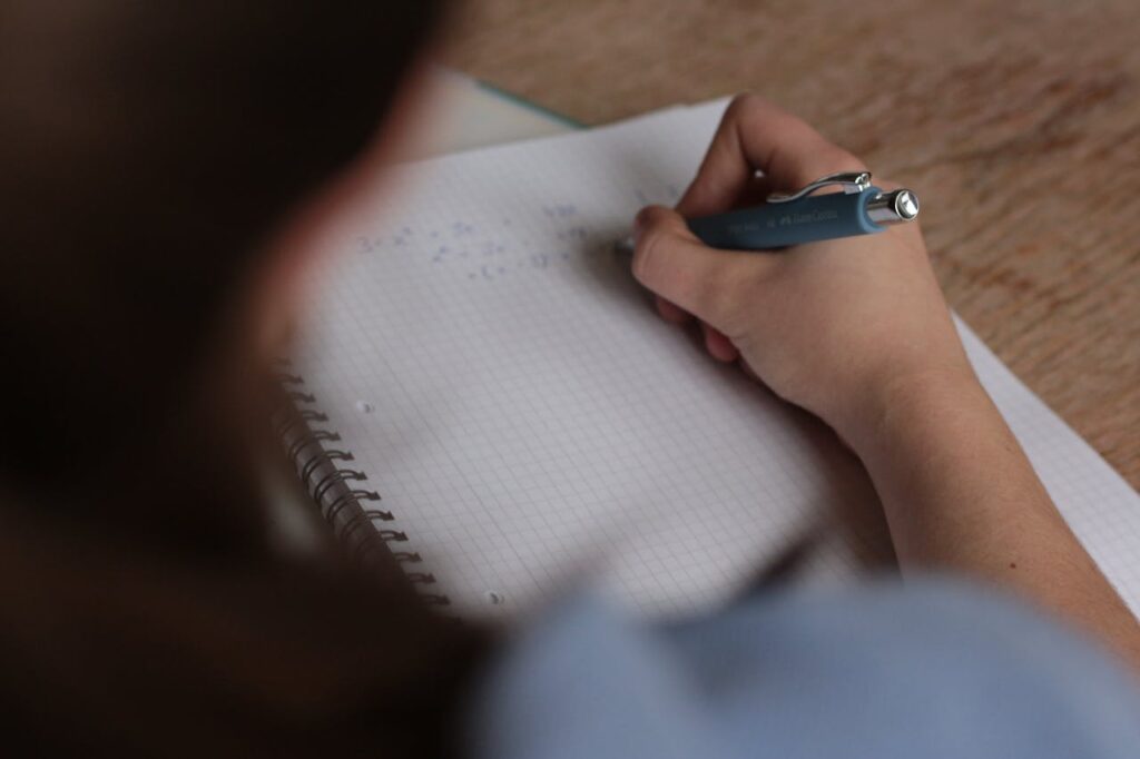 person writing something