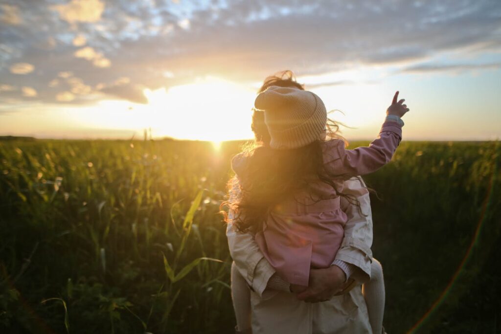 woman holding a girl