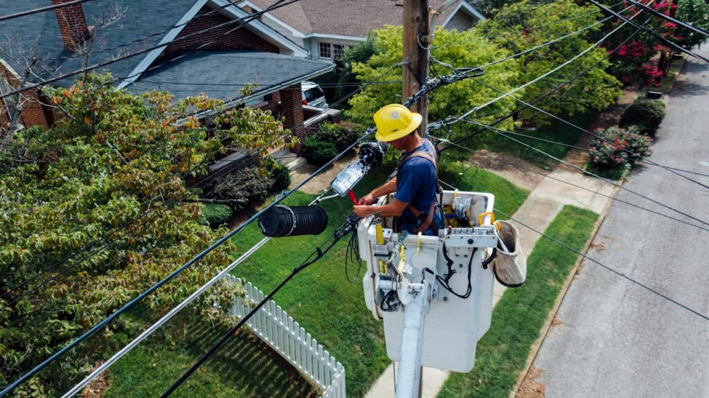 man repairing wires