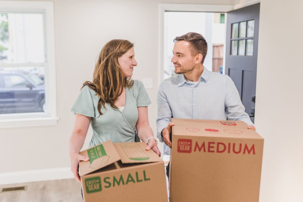 couple holding boxes