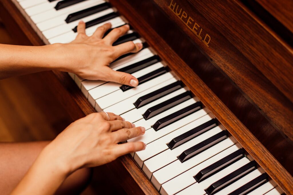 Person Playing Piano