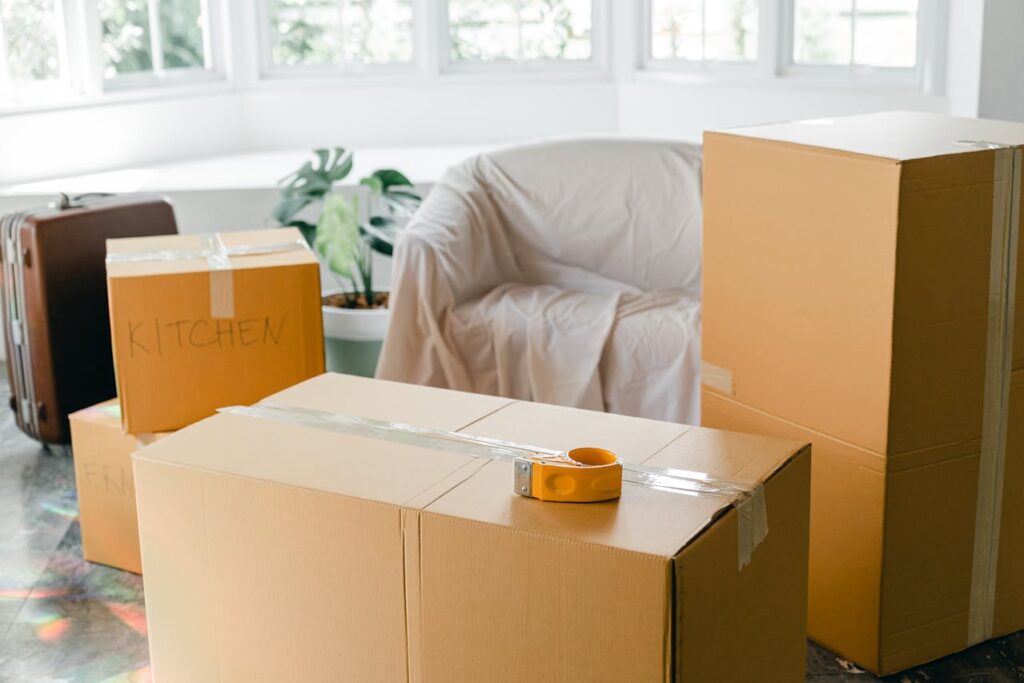 boxes in a room near couch