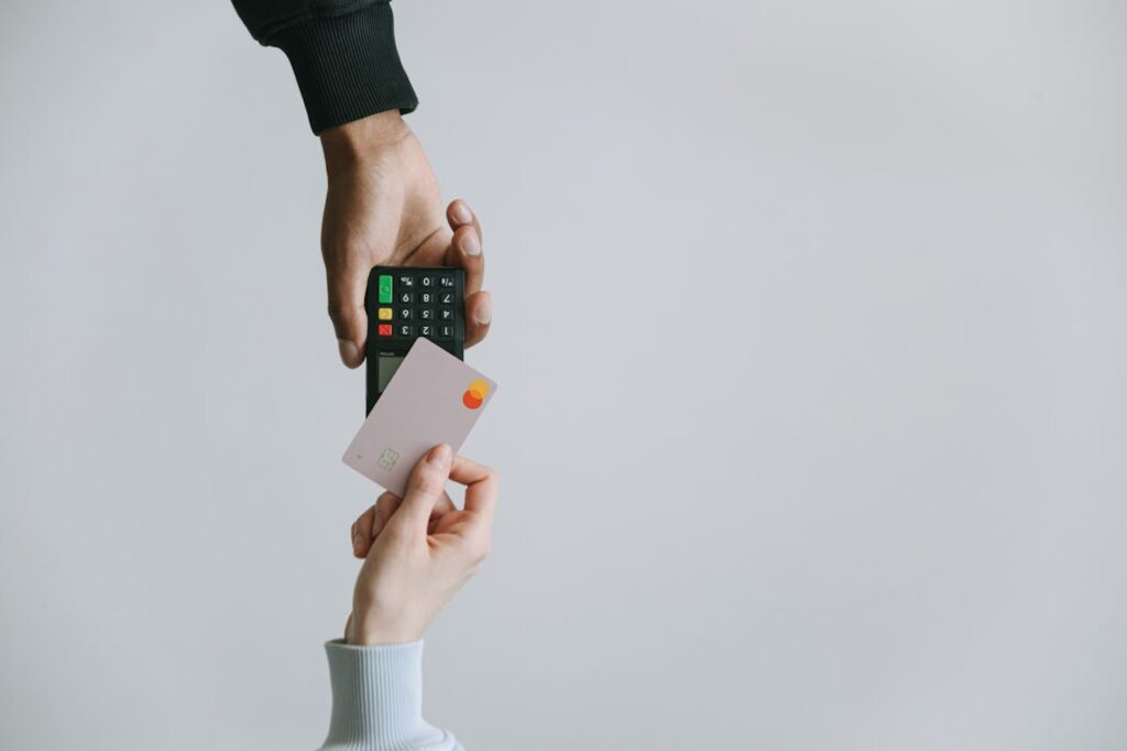 Person Holding White and Black Smartphone
