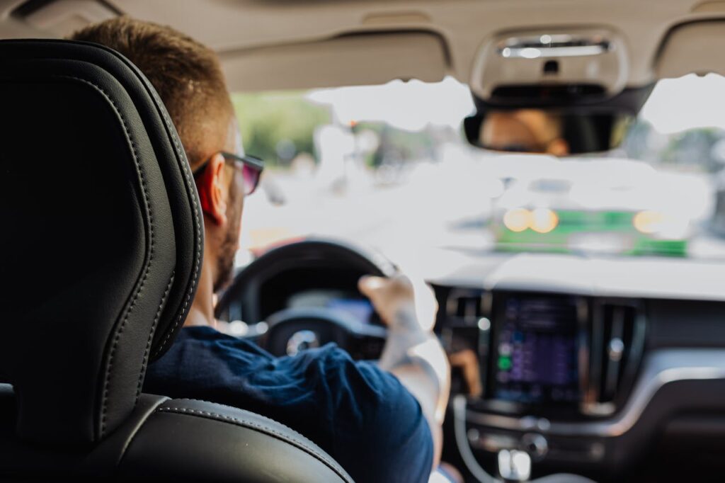 Man Driving Modern Car
