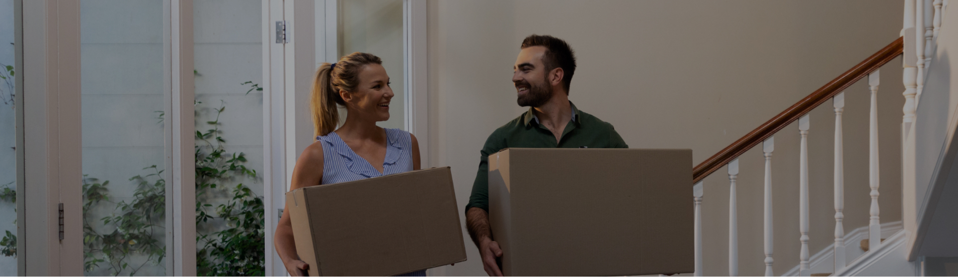 couple with moving boxes