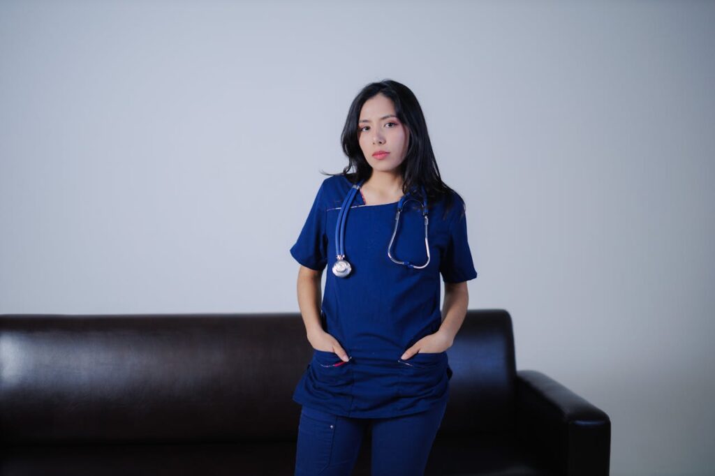 Confident Nurse Standing with Stethoscope