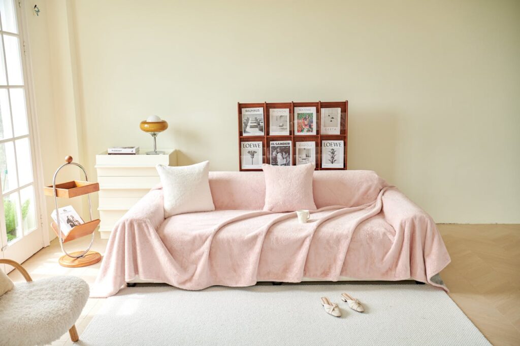 Modern Living Room with Soft Pink Sofa Cover
