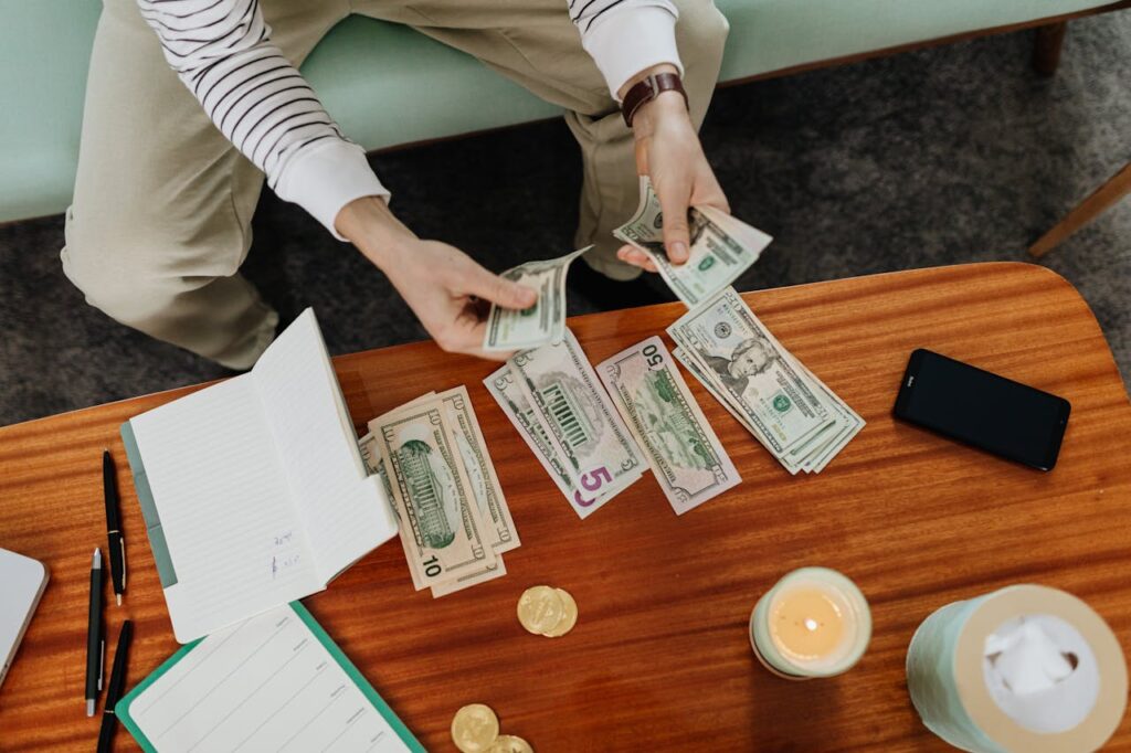 A Person Holding Bank Notes