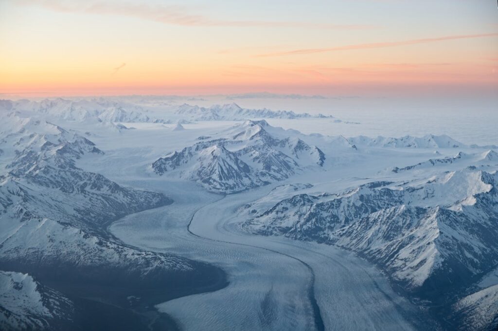 Drone Photography of Snow Covered Mountains