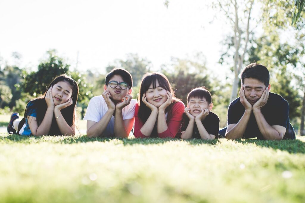 Family taking picture after moving to one of the best cities for families in the US